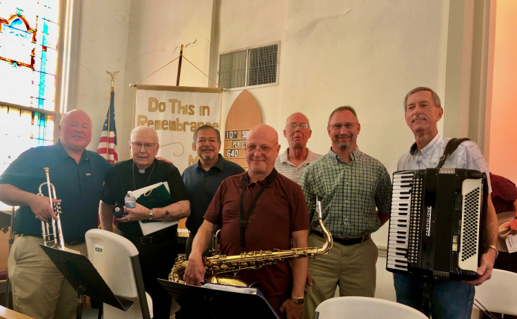 Praha Brothers Polka Band members, from left to right are Billy Havlik, the late Rev. Ardene Wuthrich, David Fraga, Russell Kalkbrenner, Tom Jones, Bernard Strmiska, and Jerry Haislera, perform a recent Polka Worship at St. John Lutheran Church in Bartlett. Photo courtesy of Ronnie Persky.