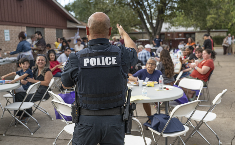 Georgetown Police Department officer Cesar Salinas  spoke to attendees at the National Night Out observance held at the Georgetown Housing AuthorityÕs Stonehaven site  on Tuesday, October 7, 2025.