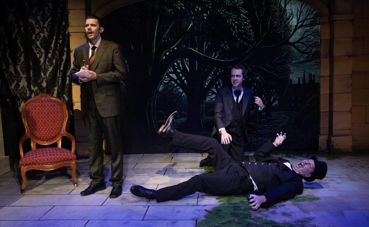 Parker Couch and Robert Slack investigate a scene with Erik Powers (floor) performing as Actor 2.