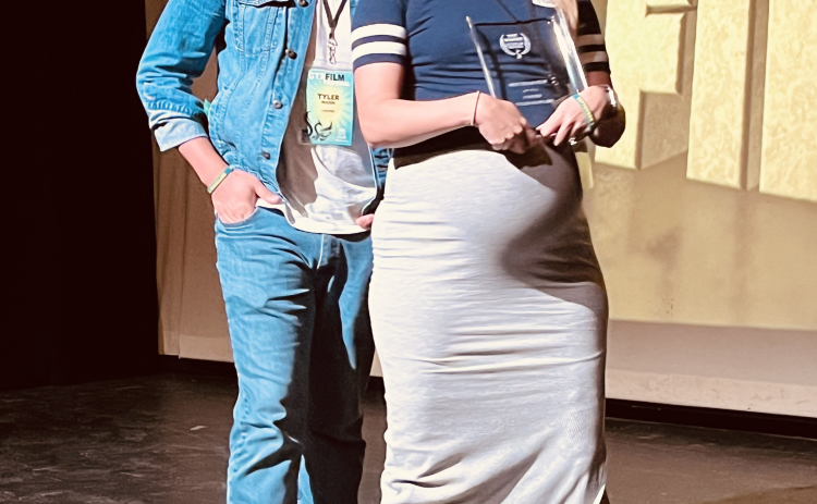 I VOTED Director Tyler Mann and wife/co-producer Rachel DeRouen accept an award at the GTX Film Festival.