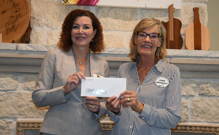 Yesterday’s Gone Founder and Director LoreeTamayo stands with Judy Madsen, WHO vice president.