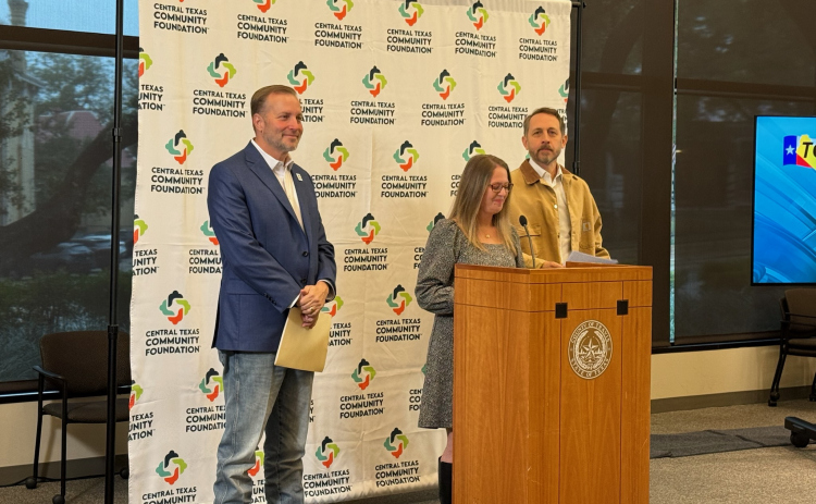 Williamson County Judge Steve Snell, left, Central Texas Community Foundation executive director Amy Merida, center, and Travis County Judge Andy Brown, right, provide an update on the financial assistance to the July floods, December 1. Photo courtesy of  Williamson County.
