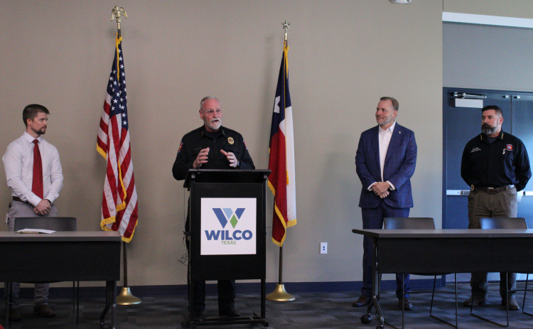Williamson County emergency officials provide the public with safety information for potential hazardous winter weather. From left: Matt Williamson, Wilco’s road and bridge division director; Bruce Clements, emergency management director; County Judge Steve Snell; and Bill Zito, senior director of Emergency Services.  Photo by Nalani Nuylan