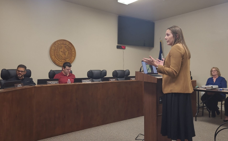 Courtney McWhorter, real estate attorney for Land Sale TX, explains her client's frustration in the lack of progression on a property in Jarrell during the January 6 city council workshop. Photo by Nalani Nuylan.