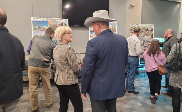 County Commissioners Valerie Covey, left, and County Sheriff Matt Lindamann, right, participate in the January 15 Justice Complex Project open house at the EMS North Campus. Photo by Nalani Nuylan.