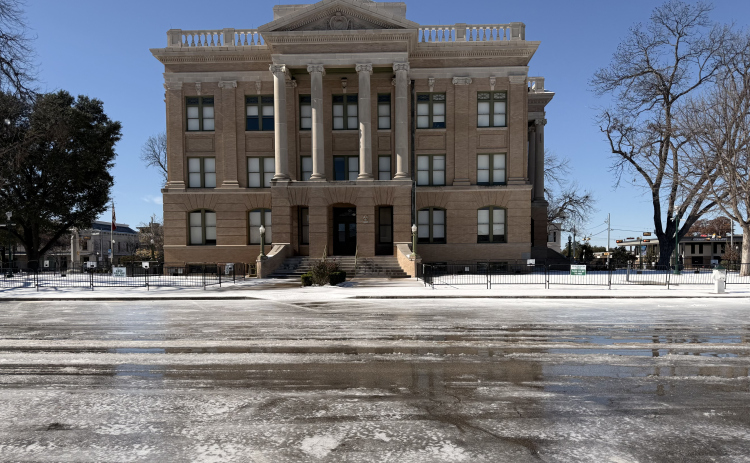 An empty Square and Williamson County Courthouse were icy Monday, January 26, after a strong winter storm brought heavy rain, sleet and ice over the weekend. (Photo by Jessica Ohle)