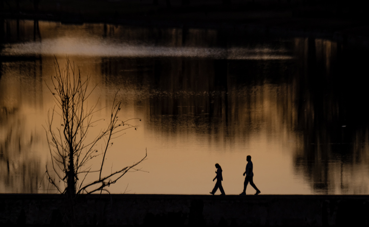 A family takes a walk across the dam over the San Gabriel River on the northern section of  San Gabriel Park  on Saturday, January 3, 2026.   Photo by Andy Sharp