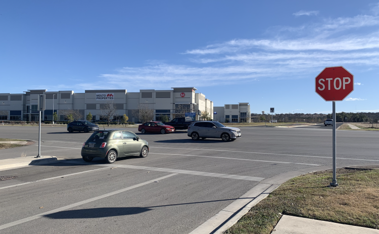 Cars on January 14 pass the Snead Drive/Blue Springs intersection with SE Inner Loop, one block east of Austin Avenue and Interstate 35. A traffic signal and median will be added to the area in the future to improve safety. (Photo by Kaitlyn Wilkes)