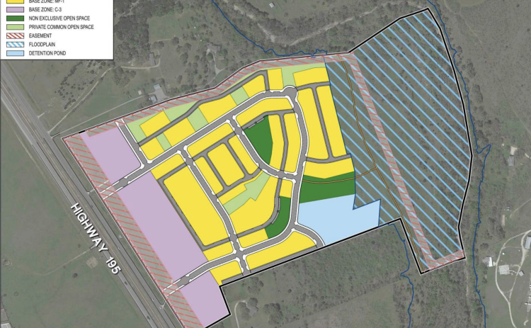 This map shows where the commercial, residential, greenspace and floodplain are located within the property. The purple shows the commercial buildings toward the front, with the yellow residential being behind it. The light green shows private common spaces and the dark green shows public common spaces. The back of the property is hatched in blue because it is in a flood plain. However, there will be a multi-use trail on that part of the property. (Courtesy of City of Georgetown)