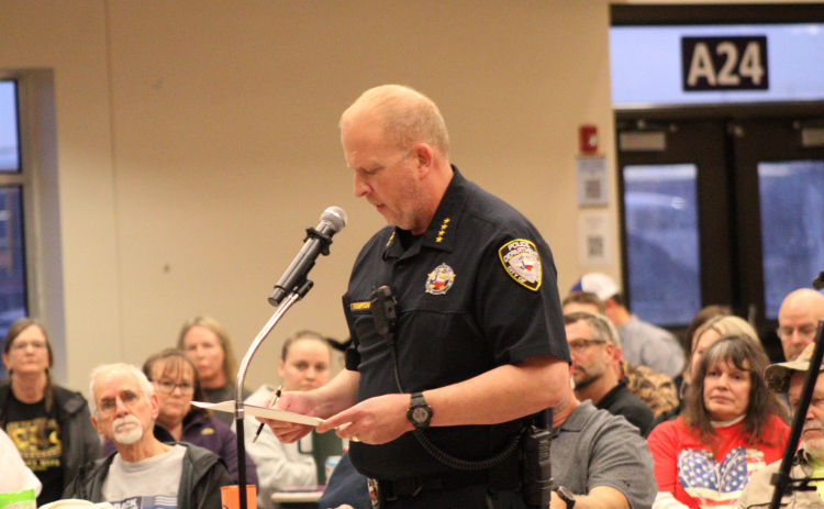 Florence Police Chief Wayne Thompson presents the monthly police report to city council on February 3. Photo by Nalani Nuylan.