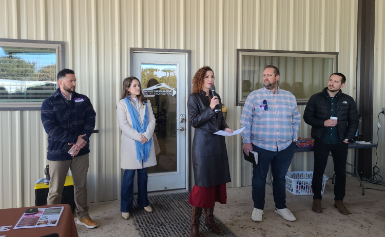 From left, Pastor Shawn Martinez from The Grove in Liberty Hill, a pastor from Celebration’s Leander/Liberty Hill campus, Yesterday’s Gone Founder and Executive Director Loree Tamayo, Pastor Nathan Brown of Vintage Church in Liberty Hill, and Pastor Jordan Geist from Northpoint in Cedar Park participated in a Blessing of the Land Ceremony as part of Yesterday’s Gone expanded property in Liberty Hill on January 29.  Photo by Nalani Nuylan.