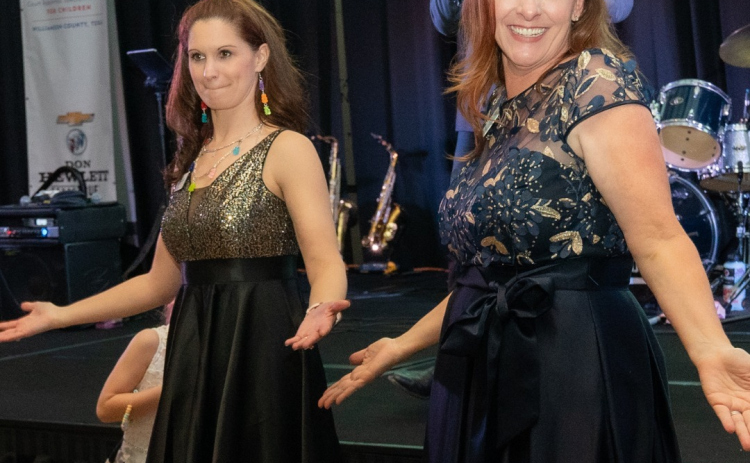 Court Appointed Special Advocates of Williamson County Chief Executive Officer Marissa Austin, left, and Williamson County Children’s Advocacy Center Chief Executive Officer Kerrie Stannell, right, during the first Destination Hope gala at Kalahari Resorts & Convention Center five years ago. Photo courtesy of the Williamson County Children’s Advocacy Center