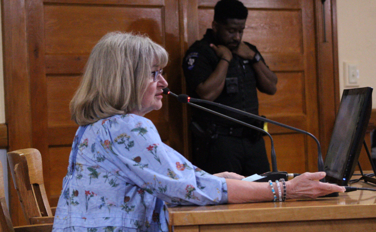 Kim Collins Gilby, Williamson County’s Democratic Party Chair, speaks during the March 10 Commissioners Court meeting after the Primary Elections on March 3. Photo by Nalani Nuylan.