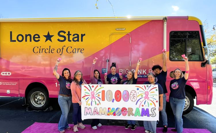 The Big Pink Bus team, from left to right: Alaina Weaver, Penny Howard, Ginza Lopez, Wendy Cordero, Domenica Cambron, Elida Gomez, Roberto Hernandez and Rebecca Sorensen celebrate The Big Pink Bus performing 10,000 mammograms for women in Central Texas. Photo courtesy of Lone Star Circle of Care.