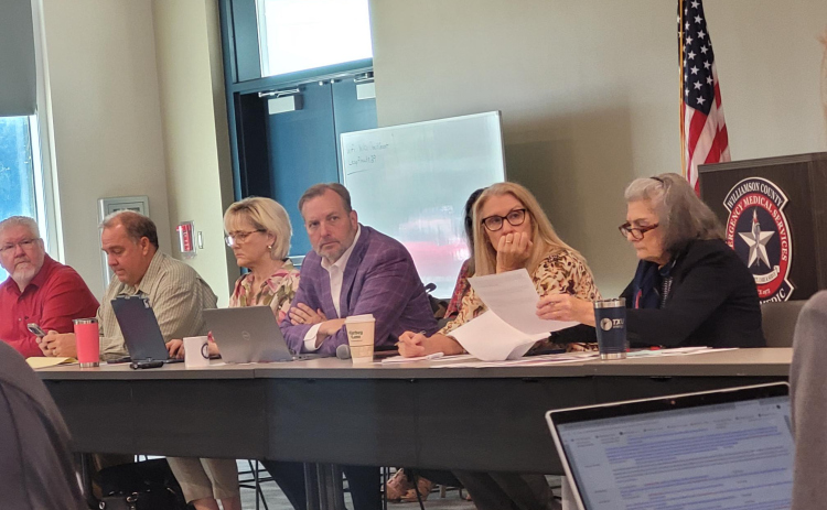 County Judge Steve Snell (center), is joined by the county commissioners Russ Boles of Precinct 4, far left, Valerie Covey of Precinct 3, center left, Cynthia Long, center right, and Terry Cook, far right) as they listen to the county department heads’ needs for the upcoming budget during a workshop on Friday, April 10. Photo by Nalani Nuylan.