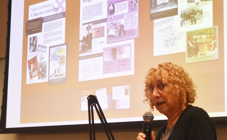 Deborah Roth-Howe shares her family’s story of life in Roth, Germany, under Nazism in the 1930s. Her exhibit at the Georgetown Public Library can be viewed through May 21.