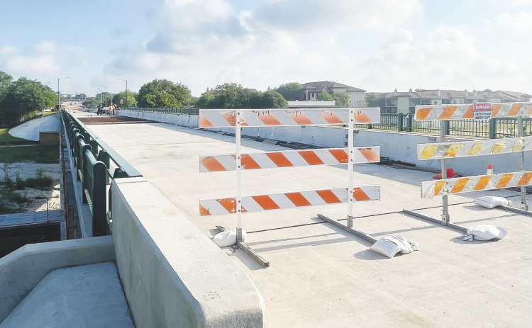 Construction on the Austin Avenue bridge has been paused since this winter, when issues with the work were discovered. (Sun Archive)