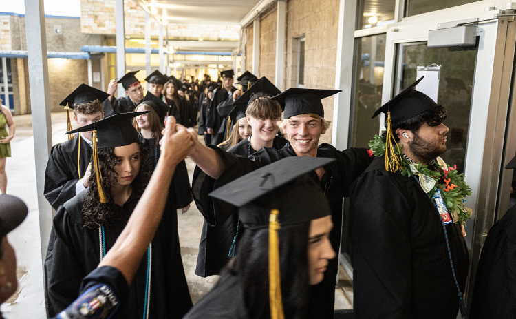 Richarte High School graduating seniors make their way from the Georgetown High Gymnasium into the Rodney and Mary Klett Performing Art Center during  the Class of 2026 Commencement on Thursday, May 21, 2026.
