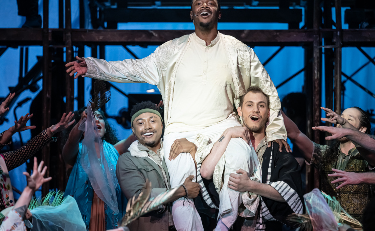 Nathaniel Fomby, center,  playing Jesus, is pictured with Theron Howard, left, as Peter, and ensemble cast member Jake Jordan, right.