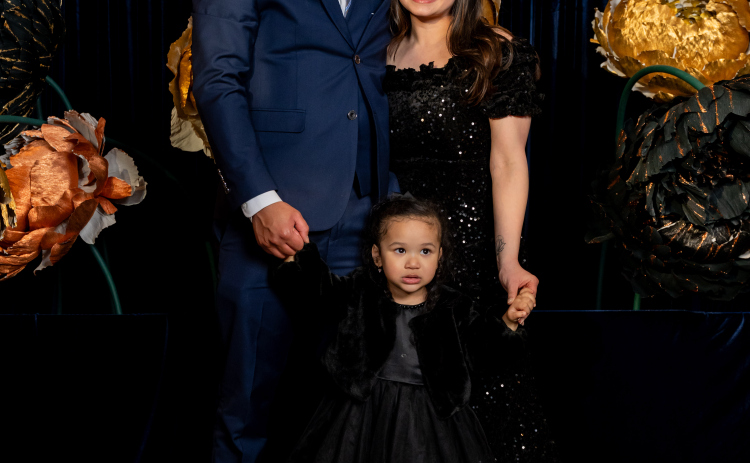 Liberty Hill family Blake Faciane (left), Linda Huynh (right), and their daughter Milah, 3, attend the Dell Children’s Foundation Star Ball after Milah made a full recovery at Dell Children’s Medical Center. Photo courtesy of Linda Huynh.