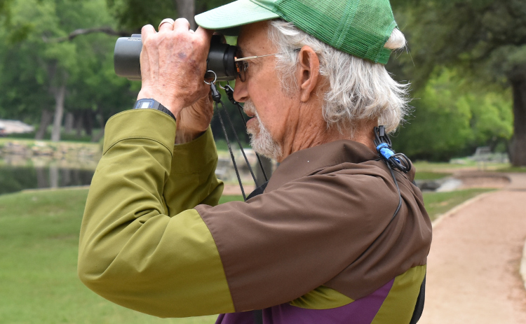 Martin Byhower, who also advises people on native planting for their lawns, led the bird watching group for the Sun City Nature Club on May 8. (Photos by Kaitlyn Wilkes)