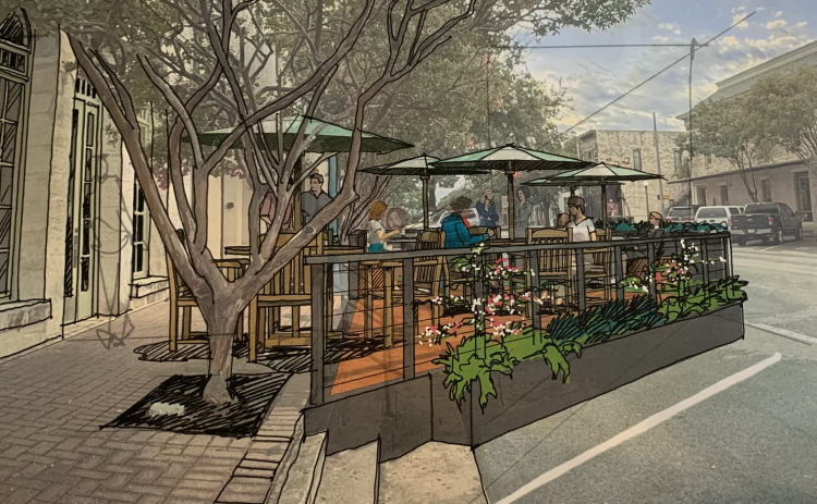 This rendering of the parklet shows what it would look like from the side, including how it would be delineated from parking spaces. It also highlights how the chairs and umbrellas could be laid out. (Rendering Courtesy City of Georgetown)