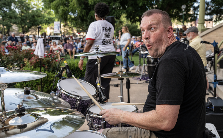 Derek Noe, drummer with Vinyl Countdown G/ATX!  Performs during the free First Friday concert held on the Williamson County Courthouse lawn on Friday, June 12, 2026.  The concerts, hosted by the Georgetown Beard Club, are generally on the first Friday of the month, but this one was postponed because of rain last week.     Photo by Andy Sharp