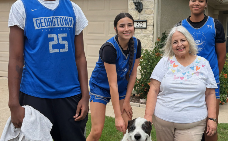 Among the young athletes' many ways of helping Sun City residents were washing dogs and windows, planting flowers, weeding flower beds and pruning shrubs. The teams' service initiative is called "Helping Hands."