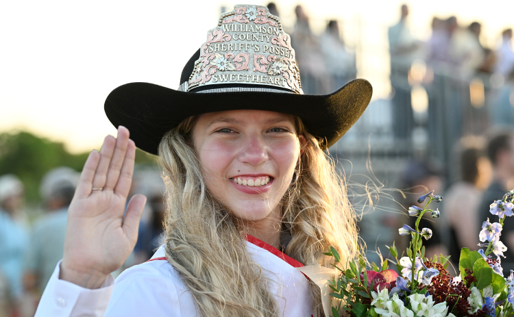 2026 Rodeo Sweetheart Aleena Isham, 17, waves during the 82nd Annual Williamson County Sheriff’s Posse Rodeo on Friday, June 26, 2026. The rodeo continued through Saturday night.    Photo by Andy Sharp
