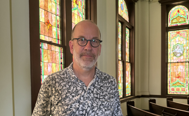 Architect Doug Moss stands inside the former First Presbyterian Church in Taylor, which is being transformed into commercial space for restaurants.   Photo by Abbey Archer