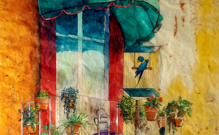This wax resist painting from Patricia Nichols is one of many techniques represented in her and Jim Roseberry’s exhibit.