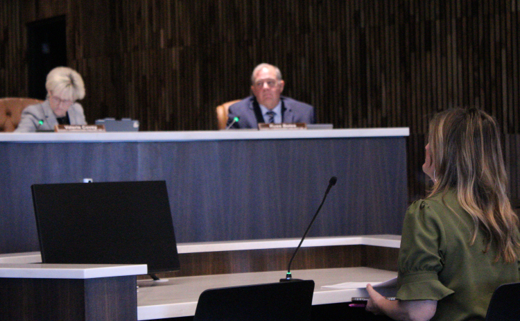 Sally Bardwell, Williamson County’s Housing and Urban Development Grant coordinator (front), presents the 2026 Action plan during the August 4 Commissioners Court meeting. Photo by Nalani Nuylan.
