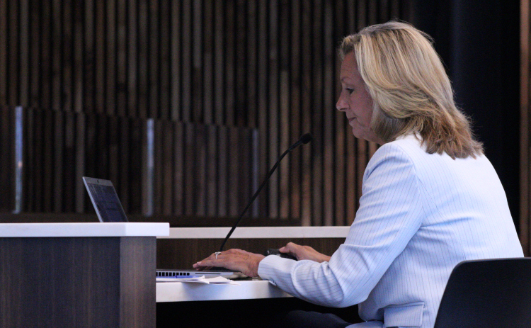 Williamson County Budget Officer Ashlie Holladay presents the county’s Fiscal Year 2027 Budget to the Commissioners on Tuesday, August 11, in the county Administration building. Photo by Nalani Nuylan.