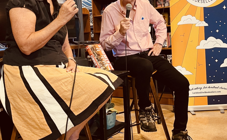 Moderator Sarah Eckhardt and author John A. Jenkins speak during a Lark & Owl event.  Photo by Linda Dwyer