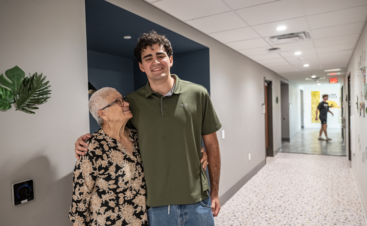 Sol Arce, left, hugs her freshman  grandson Jonas Aguiar of San Antonio  as he moves into Jessie Daniel Ames Hall on Saturday, August 15, 2026 during freshmen move-in day at Southwestern University.   Jessie Daniel Ames Hall opened to students in January.  The approximately 1400 students will begin their classes on August 24th.   Photo by Andy Sharp