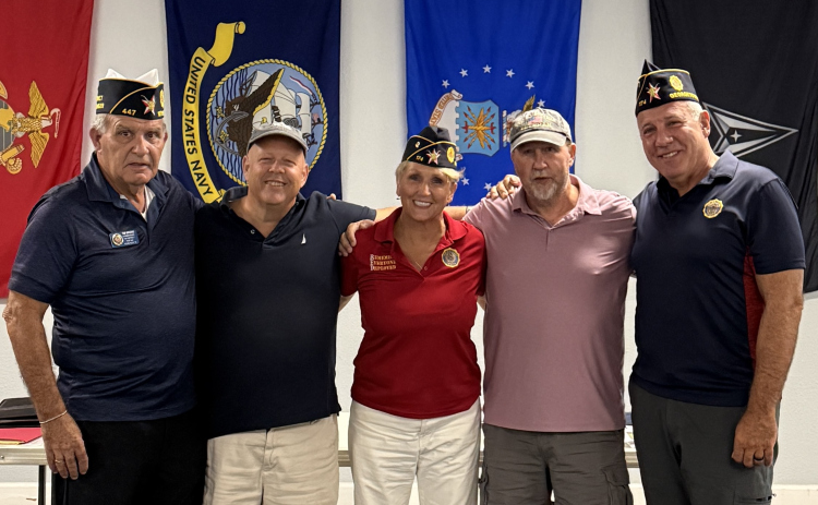 Newly installed officers of Post 174 after their installation on August 13th 2026. From left to right: District 10 Commander Tim Moore, Post Judge Advocate Michael Tischer, Post Member Sara Vasso (née Tischer), Post Historian Andy Tischer, Post Commander Amery Vasso.  Courtesy Abe Harrison Post