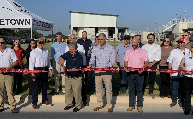 Members from the City of Georgetown, plant contractor Webber and design engineering firm CDM Smith gather to cut the ribbon on the opening stage of the South Lake Water Treatment Plant on August 4. (Photos by Kaitlyn Wilkes)