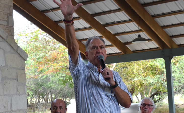 Resident Kim Williams speaks to his neighbors at an event he hosted on October 14 about new age-restricted housing that will go in near Sun City. (Photo by Kaitlyn Wilkes)