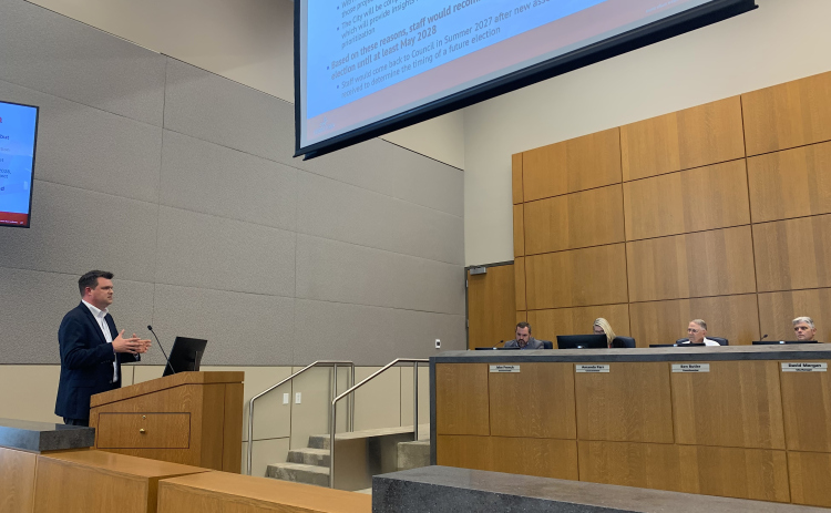 Assistant City Manager Nick Woolery speaks to Georgetown City Council about changes that will have to be made to the city’s capital project timeline. (Photo by Kaitlyn Wilkes)