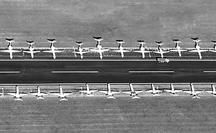 Forty-eight Citation jets sit wingtip to wingtip on Georgetown airport’s east-west runway Thursday afternoon, as their owners meet in Austin at this year’s convention of the Citation Jet Pilots association. Other jets parked elsewhere on the airport brought the total to around 100 airplanes. CLARK THURMOND