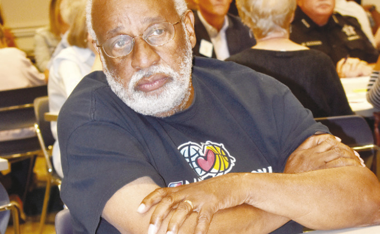 Participant Richard Glasco listens during Thursday’s forum. KATHERINE ANTHONY