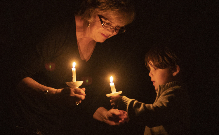 Beverly Harrison, a Georgetown resident and school alumnus, with grandson Simon Harrison at Southwestern University’s Candlelight Service for the Season of Advent December 6, 2018, in the Lois Perkins Chapel. SUN ARCHIVE