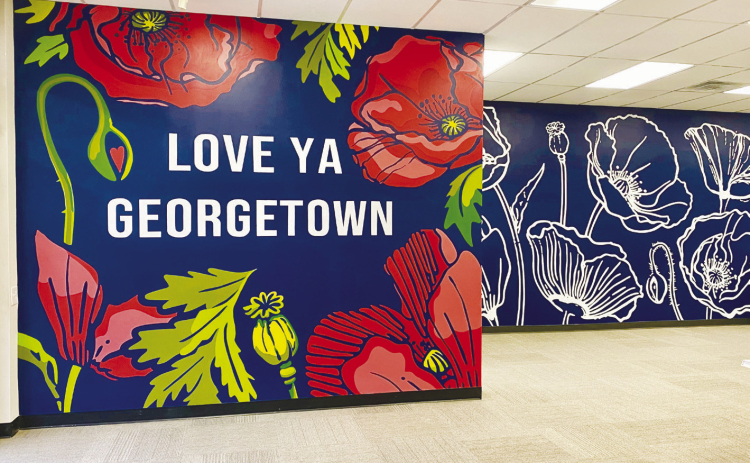Gus’s Drug’s latest mural was created by artist Sarah Blankenship. PHOTO BY ELLEN GREENEY