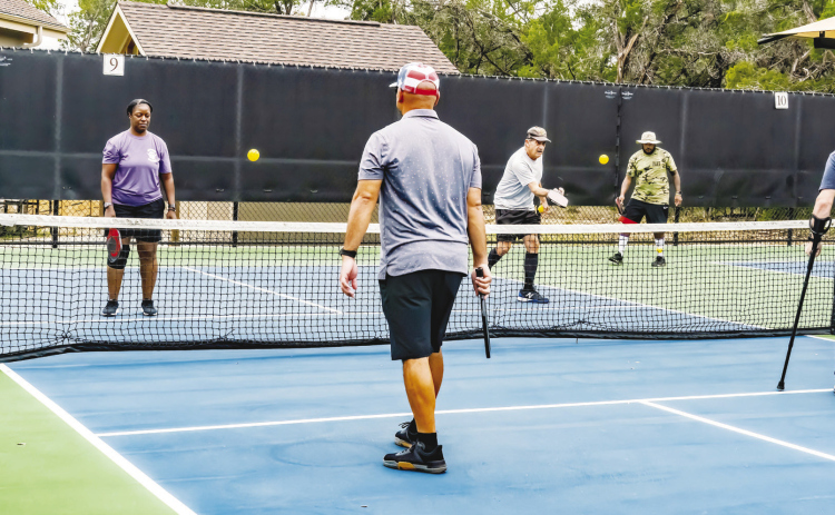 A group of soldiers who are part of the Army Recovery Care Program met with area pickleball clubs November 8 to learn the sport and get exercise. COURTESY FAITH BURNS